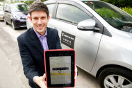 Regional General Manager of Uber Technologies in Southeast Asia Michael Brown poses in front of the newly launched UberX range, on August 6, 2014. — Picture by Saw Siow Feng