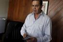 Rafael Callejas, a former Honduran soccer federation   chief, attends an interview with Reuters in his office in Tegucigalpa