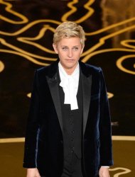 Host Ellen DeGeneres speaks onstage during the Oscars at the Dolby Theatre on March 2, 2014 in Hollywood, California