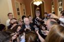 Sen. John McCain attends a rare Sunday session to   debate Patriot Act in Washington