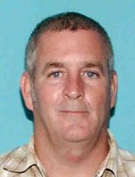 This photo provided by the Baton Rouge Police Department shows a mug shot of Ernesto Alonso. Louisiana police say the handyman arrested in Florida is accused of kidnapping and strangling his Baton Rouge employers. (Baton Rouge Police Department via AP)