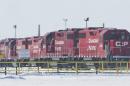 Canadian Pacific locomotives idle on the track at the Cote St-Luc yard in Montreal, Sunday, February 15, 2015. More than 3,000 Teamsters members have gone on strike at the Canadian Pacific Railway (TSX:CP)after contract talks failed to reach an agreement before the midnight deadline. THE CANADIAN PRESS/Graham Hughes