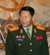 FILE - Laotian Defense Minister, Douangchay Phichit, is seen during a visit to Moscow in this Tuesday, April 27, 2004 file photo. A Laos air force plane believed to be carrying 20 people including the country's defense minister crashed on Saturday May 17, 2014, Thailand's Foreign Ministry said. (AP Photo/File)