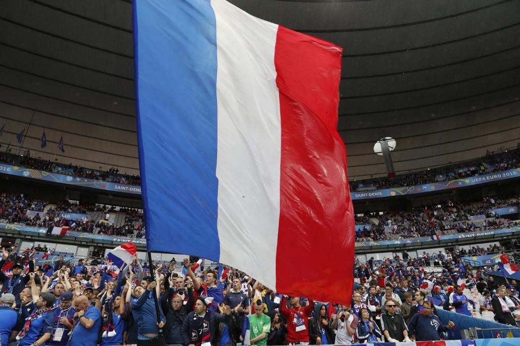 France fans wave a flag before the game