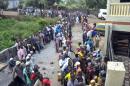 File d'attente devant un bureau de vote le 11 octobre 2015 à Conakry