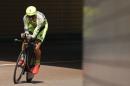 Il ciclista italiano Ivan Basso durante le prove individuali per il Tour de France. L'atleta si è ritirato dalla competizione dopo aver scorperto di avere un tumore.