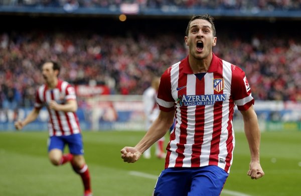  - atletico-madrids-jorge-koke-resurrecion-celebrates-after-scoring-goal-against-real-madrid-20140605-151004-361