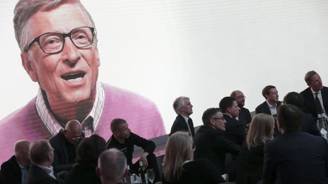 Microsoft co-founder Gates is seen on a screen during the awards ceremony of the newly established Axel Springer Award in Berlin
