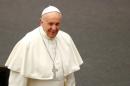 Pope Francis arrives to lead his Wednesday general   audience in Paul VI hall at the Vatican