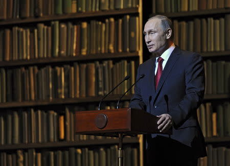 Russian President Vladimir Putin addresses the audience at the Mariinsky Theatre in St. Petersburg, Russia, December 14, 2015. REUTERS/Michael Klimentyev/Sputnik/Kremlin