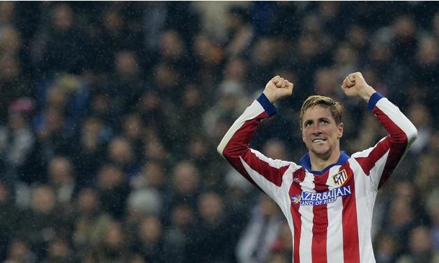 GRA353. MADRID, 15/01/2015.- El delantero del Atlético de Madrid Fernando Torres celebra el segundo gol marcado al Real Madrid, durante el partido de vuelta de los octavos de final de la Copa del Rey 