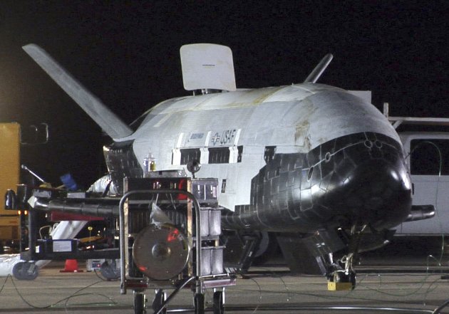 The U.S. Air Force's X-37B unmanned re-entry spacecraft is seen after returning from it's first eight-month mission at Vandenberg Air Force Base in California, in this U.S. Air Force handout photo taken December 3, 2010. The third 22-month classified mission for the robotic X-37B landed at Vandenberg Air Force Base on Friday, the Air Force said. REUTERS/U.S. Air Force/Michael Stonecypher/Handout (UNITED STATES - Tags: SCIENCE TECHNOLOGY) FOR EDITORIAL USE ONLY. NOT FOR SALE FOR MARKETING OR ADVERTISING CAMPAIGNS. THIS IMAGE HAS BEEN SUPPLIED BY A THIRD PARTY. IT IS DISTRIBUTED, EXACTLY AS RECEIVED BY REUTERS, AS A SERVICE TO CLIENTS
