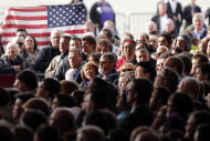 Supporters wait for Republican presidential candidate Donald Trump at the Wright Brothers Aero Hangar for a campaign rally Saturday, March 12, 2016, in Vandalia, Ohio. (AP Photo/Kiichiro Sato)