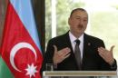 Azerbaijan's President Ilham Aliyev speaks   during a news conference at the 2014 Tbilisi Summit