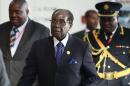 Zimbabwe's President Mugabe arrives for the   Ordinary session of the Assembly of Heads of State and Government of the AU at the   African Union headquarters in Ethiopia's capital Addis Ababa
