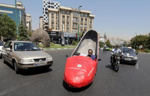 Iranian shoe-shiner Mohammad Ali Hassan Khani drives&nbsp;&hellip;