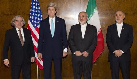 U.S. Secretary of State John Kerry (2nd L) meets his Iranian counterpart Mohammad Javad Zarif (2nd R) for a new round of nuclear negotiations in Montreux March 2, 2015. REUTERS/Evan Vucci/Pool