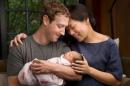 Facebook Inc. Chief Executive Mark Zuckerberg and his wife Priscilla are seen with their daughter named Max