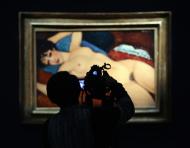 Amedeo Modigliani's "Nu Couche" or "Reclining Nude", painted in 1917-18, sold after a frantic nine-minute bidding war between seven would-be buyers on the first time the painting has ever come to auction
