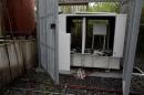 A vandalized backup generator is seen at a Movistar   facility in Los Teques