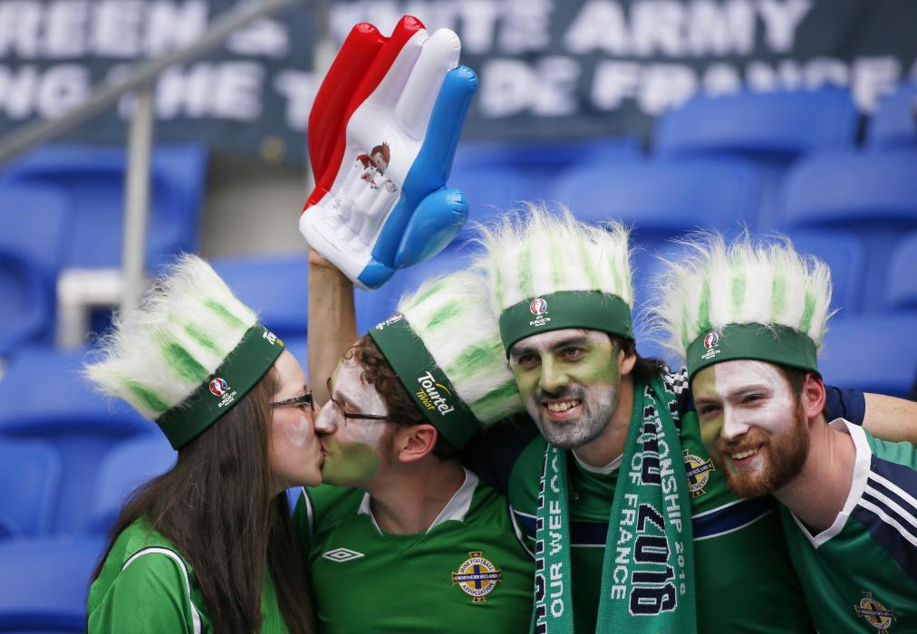 Northern Ireland fans kiss before the match