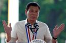 Philippine President Rodrigo Duterte speaks during a   National Heroes Day commemoration at the Libingan ng mga Bayani (Heroes'   Cemetery) in Taguig city, Metro Manila