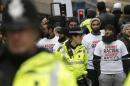 Men weat T-shirts as they take part in a   counter-demonstrations against a rally by supporters of the Pegida movement in   Newcastle, northern England
