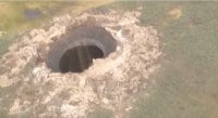 A mysterious giant hole appeared in Siberia, and scientists are puzzled by how it formed.