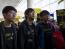 Hong Kong student leaders pose for photos while surrounded by Occupy Central protesters as they arrive at Hong Kong International Airport for their flight to Beijing