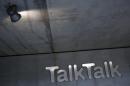 A spotlight shines on a company logo at a TalkTalk building in London