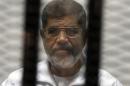 Mohamed Morsi lors de son procès le 8 mai 2014 au Caire