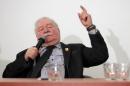 Former Polish President Lech Walesa gestures during a   conference organised by Poland's government-affiliated Institute of National   Remembrance, in Warsaw