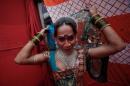 File photo of a sex worker, preparing for a   performance in Mumbai's Kamathipura red light district