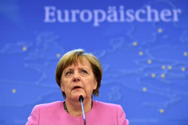 La chancelière allemande Angela Merkel donne une conférence de presse à l'issue d'un sommet européen à Bruxelles, le 19 février 2016