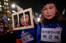 People march during a protest calling for South   Korean President Park Geun-hye to step down in central Seoul