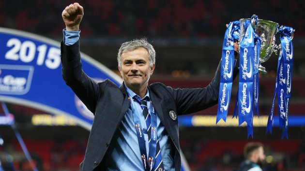 Chelsea's manager Jose Mourinho celebrates with the Capital One Cup (Reuters)