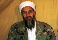 FILE - This undated file photo shows al Qaida leader Osama bin Laden in Afghanistan. After U.S. Navy SEALs killed Osama bin laden in Pakistan in May 2011, top CIA officials secretly told lawmakers that information gleaned from brutal interrogations played a key role in what was one of the spy agency’s greatest successes. CIA director Leon Panetta repeated that assertion in public, and it found its way into a critically acclaimed movie about the operation, Zero Dark Thirty, which depicts a detainee offering up the identity of bin Laden’s courier, Abu Ahmad al- Kuwaiti, after being tortured at a CIA “black site.” As it turned out, Bin Laden was living in al Kuwaiti’s walled family compound, so tracking the courier was the key to finding the al-Qaida leader. (AP Photo/File)