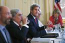 U.S. Secretary of State John Kerry, centre, meets with Iranian Foreign Minister Mohammad Javad Zarif in Vienna, Austria, Friday July 3, 2015. Iran has committed to implementing the IAEA's 