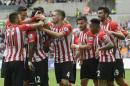 Southampton players celebrate scoring a goal against Swansea City during their English Premier League soccer match at the Liberty Stadium in Swansea