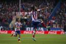 Atletico Madrid's Arda celebrates his goal against Deportivo Coruna during their Spanish first division soccer match at Vicente Calderon stadium in Madrid