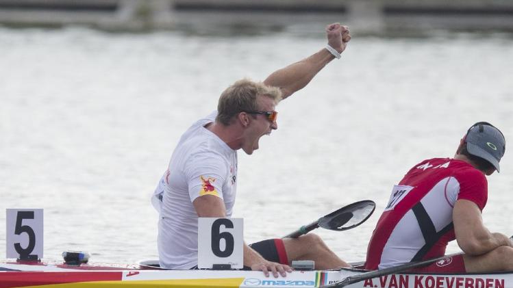 , celebrates after winning the K1 men 500m final of the ICF Canoe 