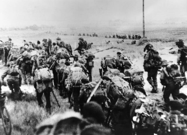 This file photo taken on June 6, 1944 shows the Allied forces soldiers landing in Normandy. - In what remains the biggest amphibious assault in history, some 156,000 Allied personnel landed in France on June 6, 1944. An estimated 10,000 Allied troops were left dead, wounded or missing, while Nazi Germany lost between 4,000 and 9,000 troops, and thousands of French civilians were killed. The 75th anniversary of the D-day landings will fall on June 6, 2019.