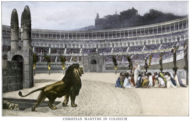 Christian martyrs facing hungry lions in the Colosseum in ancient Rome. (Photo: North Wind Picture Archives / Alamy Stock Photo) 