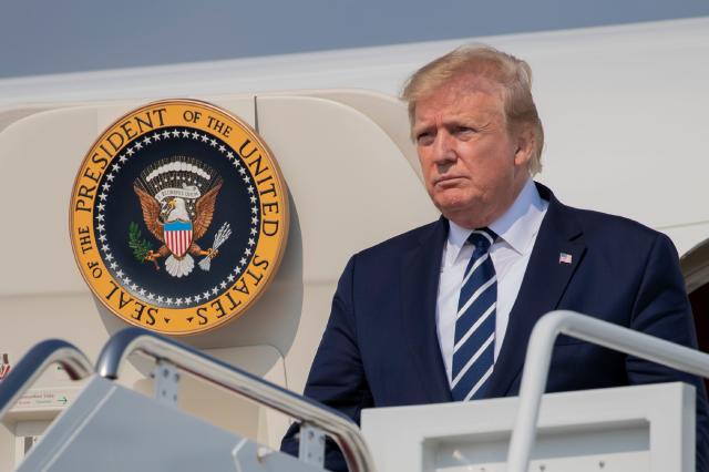 President Donald Trump disembarks Air Force One at Andrews Air Force Base, Md., July 21, 2019.