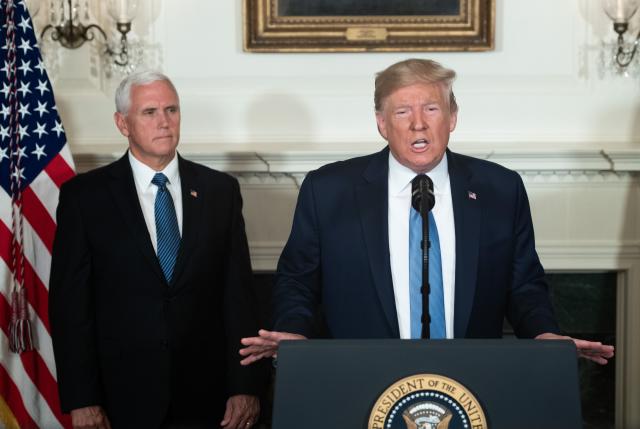 US President Donald Trump speaks alongside Vice President Mike Pence about the mass shootings from the Diplomatic Reception Room of the White House in Washington, DC, August 5, 2019. (Photo: Saul Loeb/AFP/Getty Images)