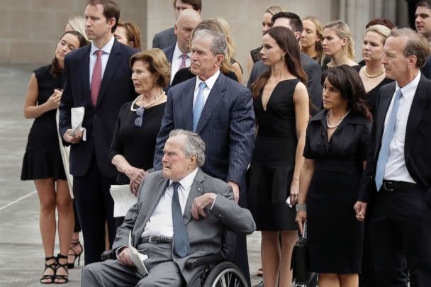 PHOTO: Former Presidents George H.W. Bush and George W. Bush accompanied by family members watch as pallbearers carry the casket of former first lady Barbara Bush following a funeral service at St. Martin's Episcopal Church, April 21, 2018, in Houston. (Evan Vucci/AP)