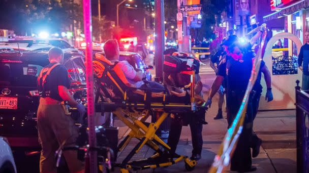 PHOTO: A man is transported in a stretcher after a shooting in Toronto on the evening of July 22, 2018. [Victor Biro via ZUMA Wire)