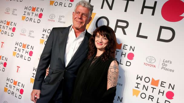 PHOTO: Anthony Bourdain poses with Italian actor and director Asia Argento for the Women In The World Summit in New York, April 12, 2018. (Brendan McDermid/Reuters, FILE)
