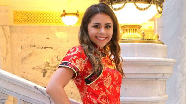 PHOTO: Keziah Daum, an 18-year-old senior at Woods Cross High School, Utah, received immediate backlash after she posted photos of her dressed in a red qipao, a traditional Chinese dress, on prom night. (Michael Techmeyer )