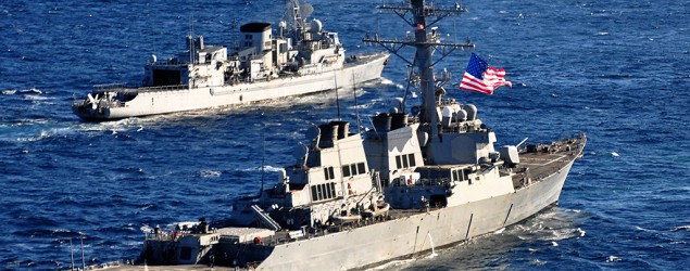 Iran's military fleet has been ordered to approach U.S. maritime borders. Image: U.S. Navy missile destroyer performs a military exercise. (U.S. Navy/Getty Images)